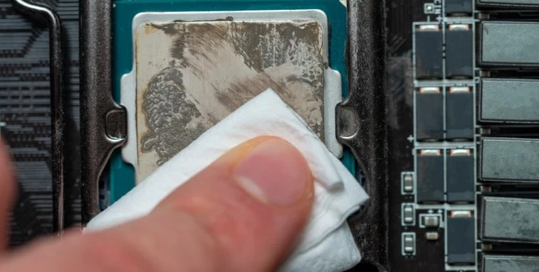 scratching the dried thermal paste